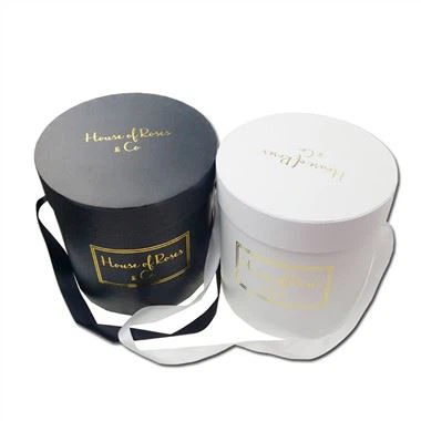 Apvalios gėlių dėžutės kaip dovanų rinkiniai